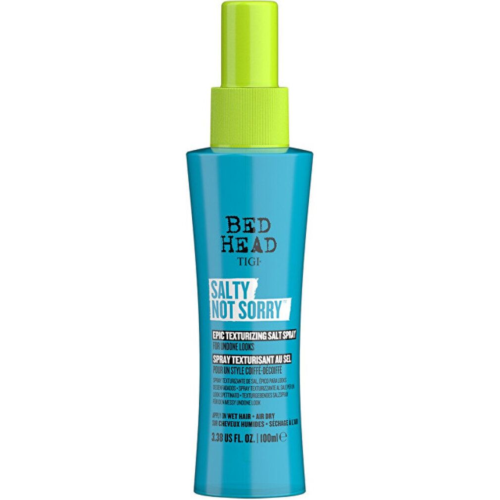 Türkisblaue Sprühflasche mit grünem Sprühkopf. Aufschrift: Bed Head Tigi Salty Not Sorry Epic Texturizing Salt Spray.