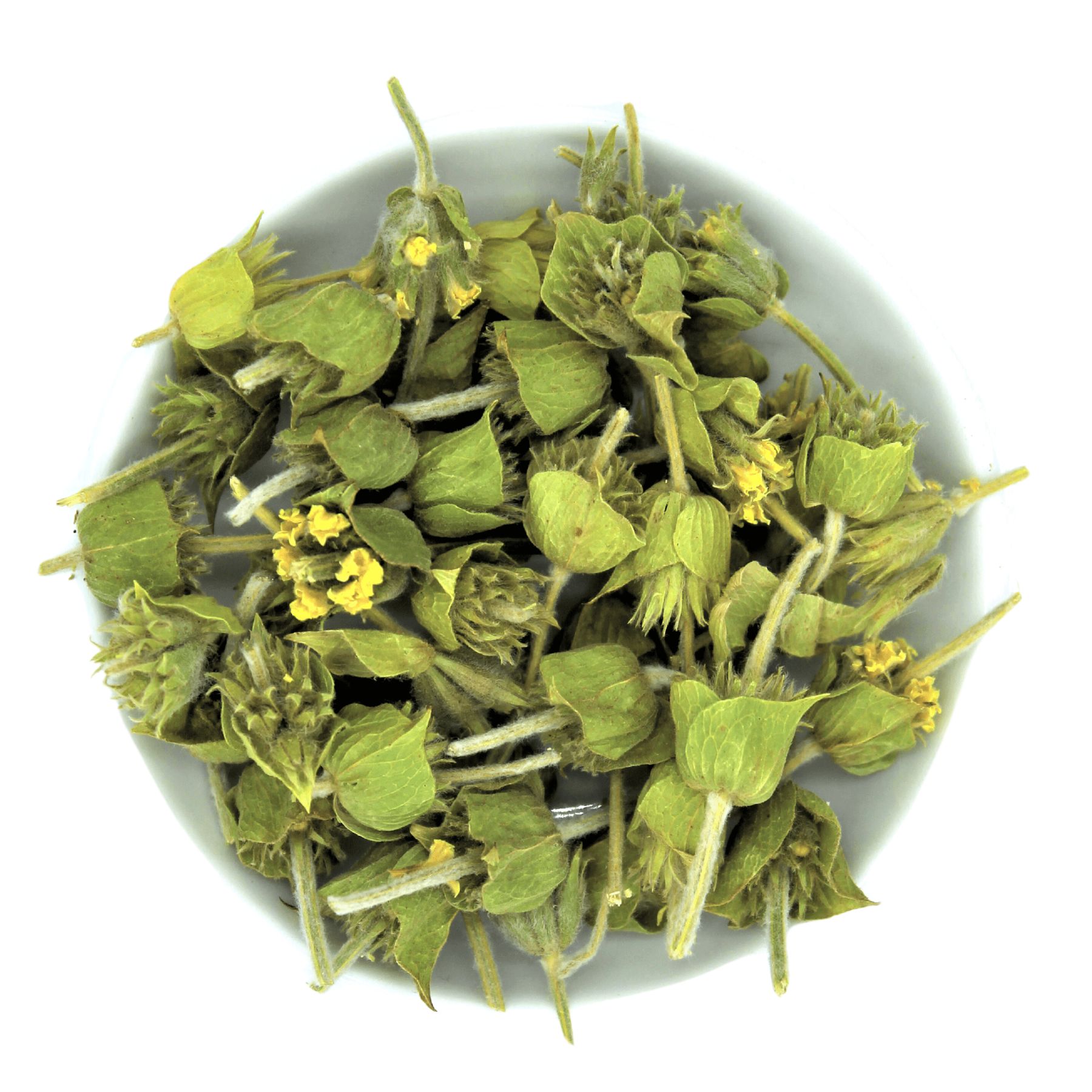 Getrocknete Bergtee-Blüten in einer weißen Schale. Draufsicht, viele Blüten und Blätter.