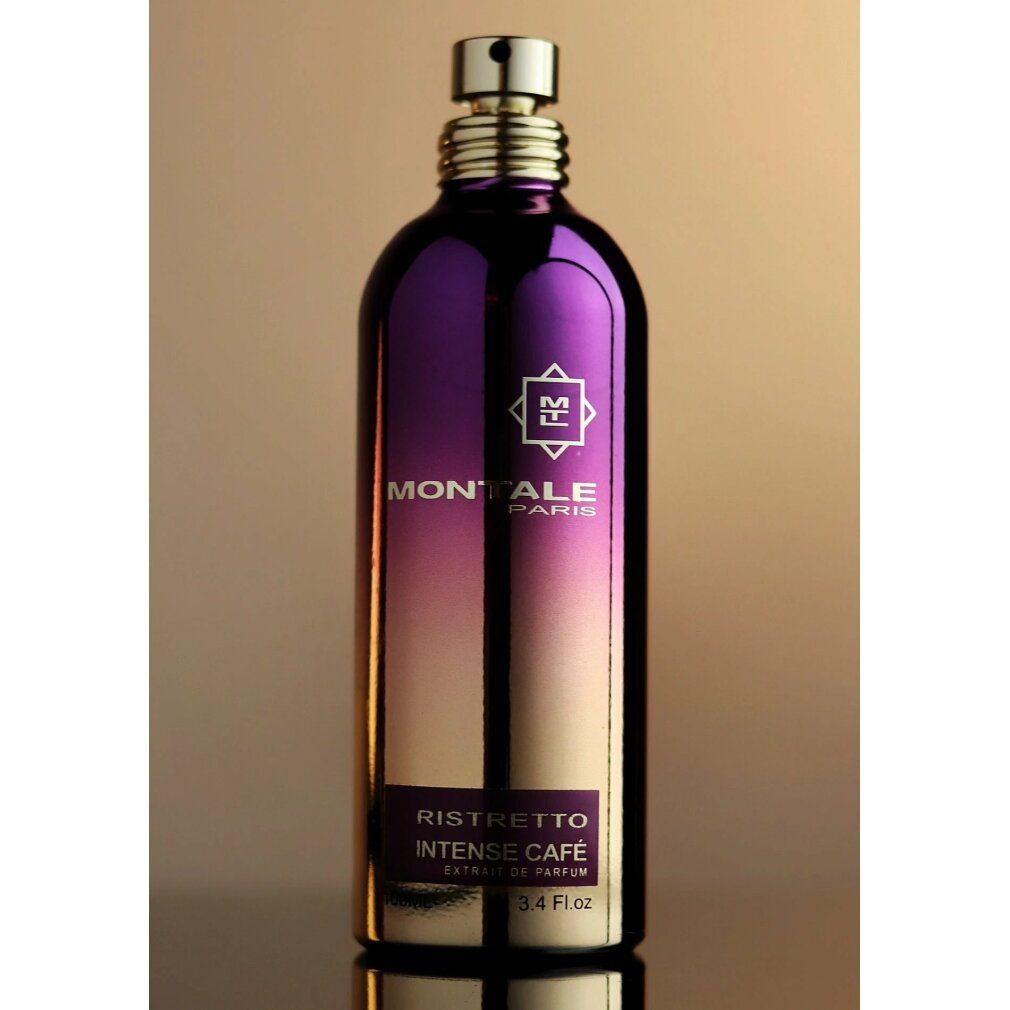 Gold-violette Flasche mit Aufschrift. Text: Ristretto Intense Cafe, 3.4 Fl.oz. Logo. Goldener Hintergrund.