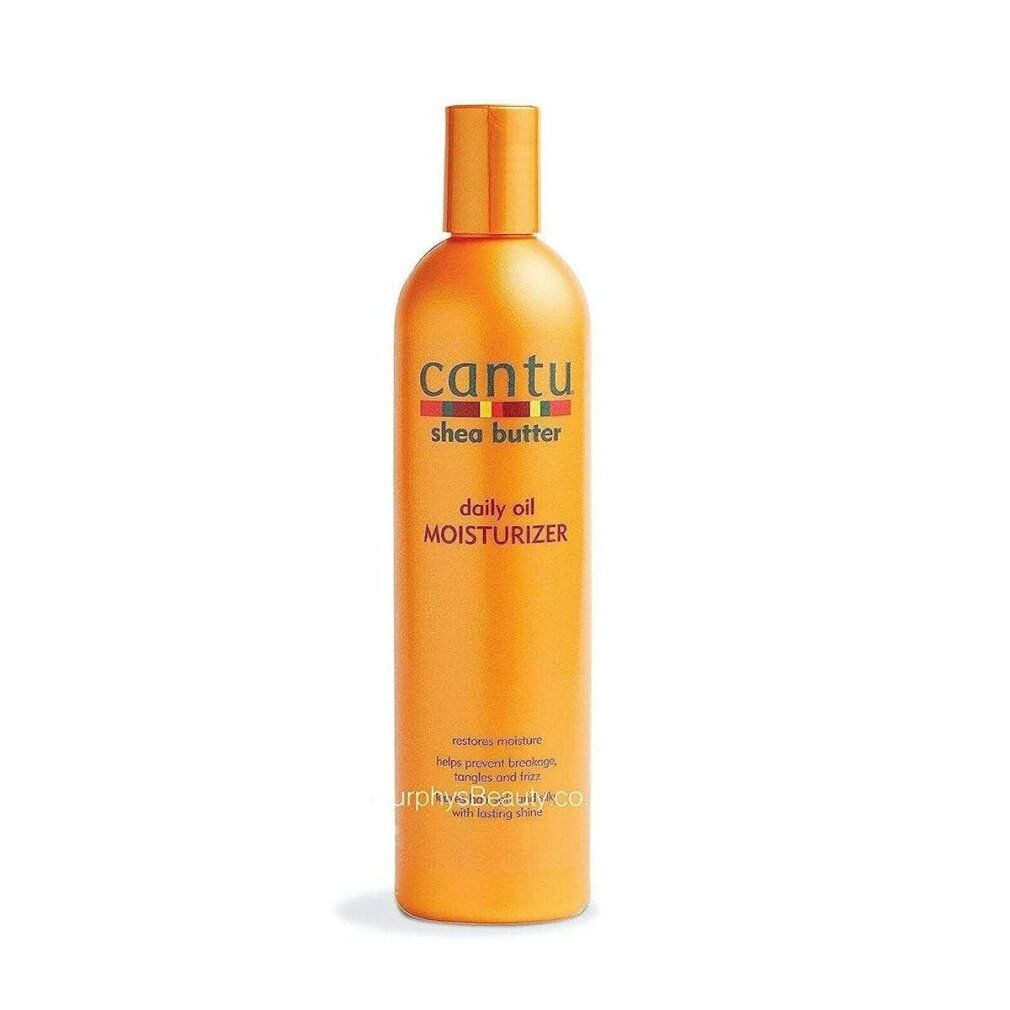 Orangefarbene Flasche mit Cantu Shea Butter Aufschrift. Produktname: Daily Oil Moisturizer. 13 fl oz / 384 ml.