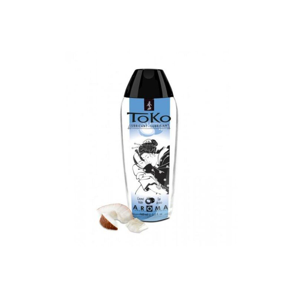 ToKo Aroma Kokoswasser Gleitmittel in transparenter Flasche mit schwarzem Verschluss. Kokosnussstücke daneben.