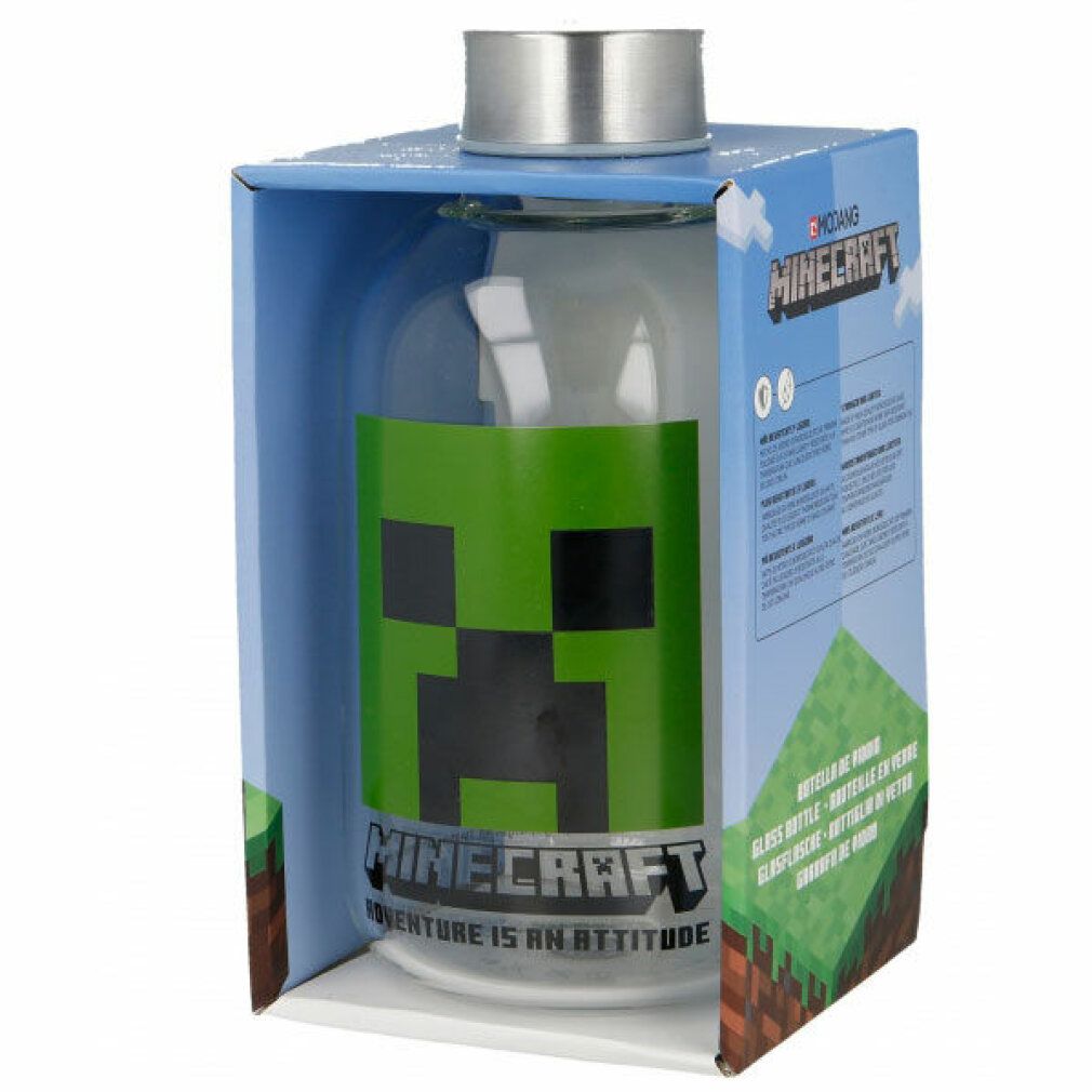 Glasflasche in Kartonverpackung. Aufdruck: grünes Minecraft-Gesicht und Schriftzug. Silberner Deckel.