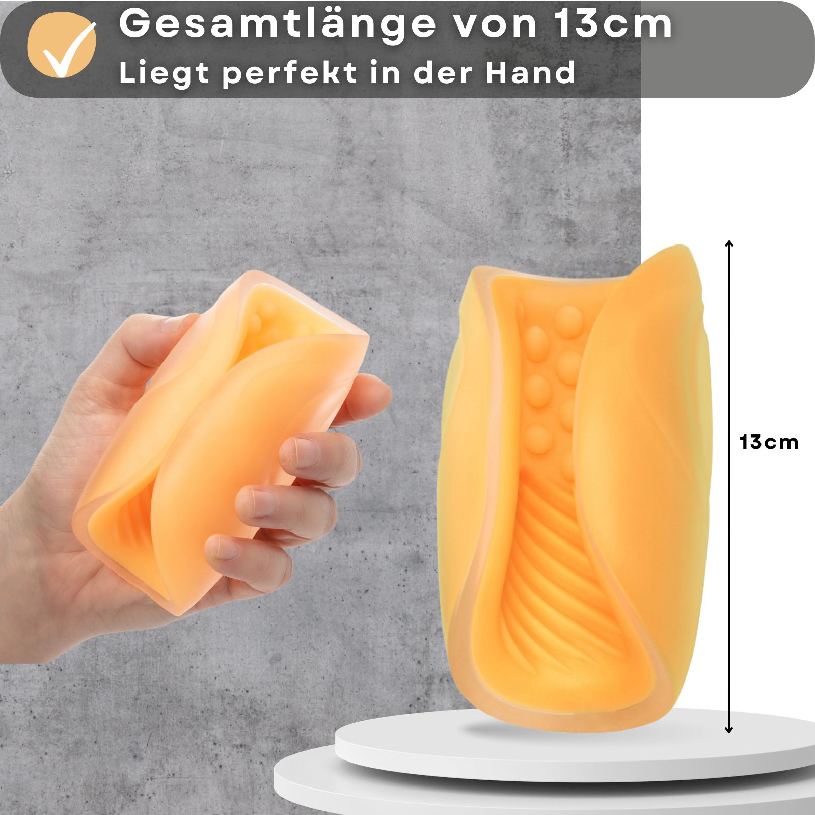 Masturbator, 13cm lang, orange. Liegt in der Hand. Mit Rillen und Noppen.