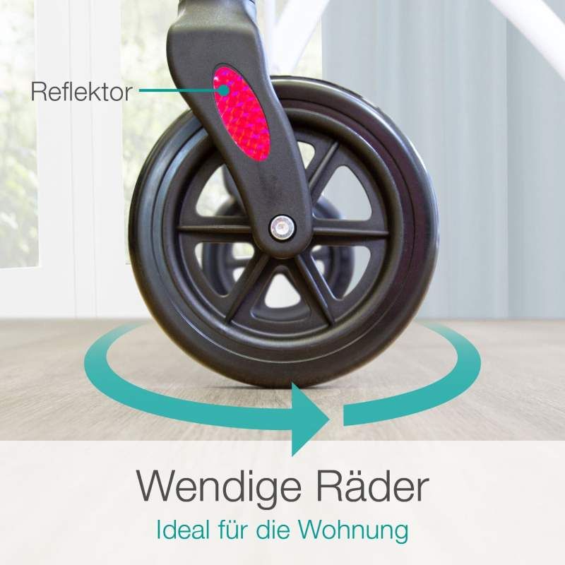 Nahaufnahme eines Rades. Schwarzes Rad mit rotem Reflektor. Text: Wendige Räder. Ideal für die Wohnung.