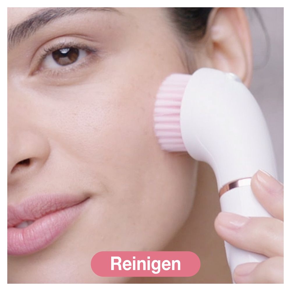 Gesichtsbürste mit rosa Borsten. Die Bürste wird auf der Haut verwendet. Text: Reinigen.