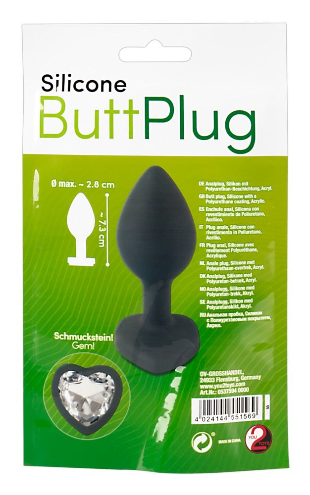 Schwarzer Silikon-Butt-Plug in Verpackung. Herzförmiger Sockel mit Schmuckstein. Abmessungen: 2,8 cm max. Durchmesser, 7,3 cm Länge.