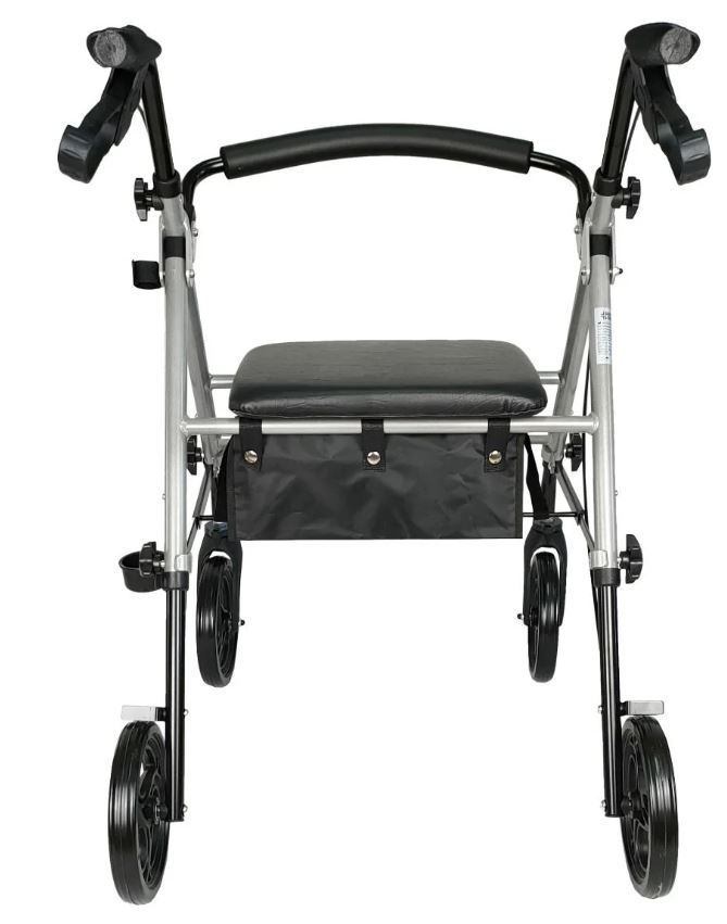 Rollator aus Aluminium mit 4 Rädern, schwarzem Sitz und Tasche. Griffe mit Bremsen. Frontansicht.