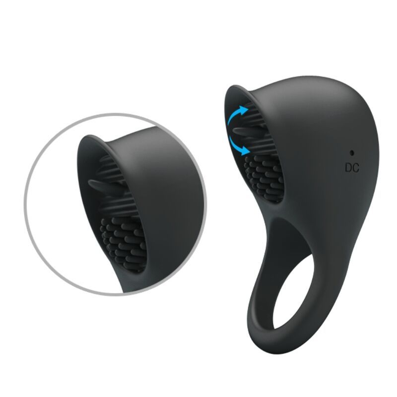 Schwarzer Penisring mit Zunge und Noppen. Detailansicht mit Pfeilen. Aus Silikon.