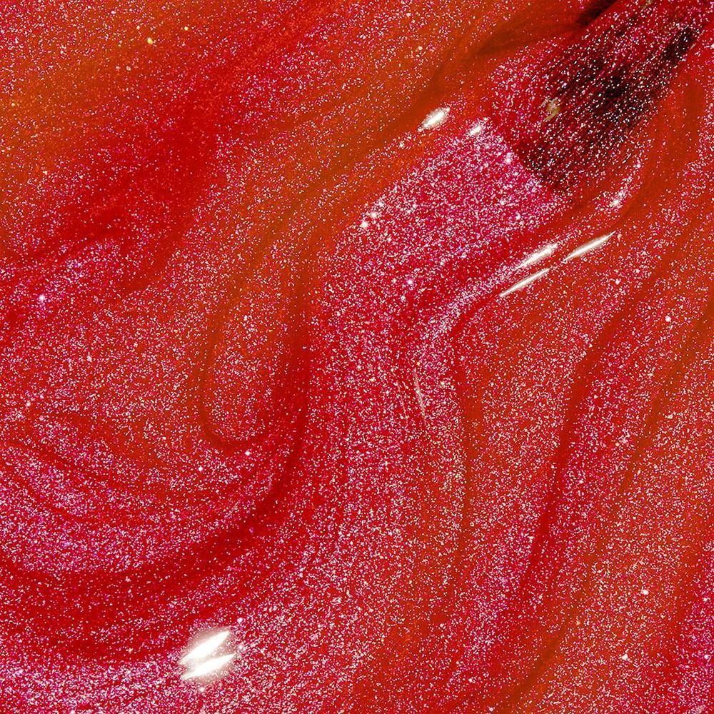 Nagellack, rot mit Glitzer. Pinselspuren sichtbar.