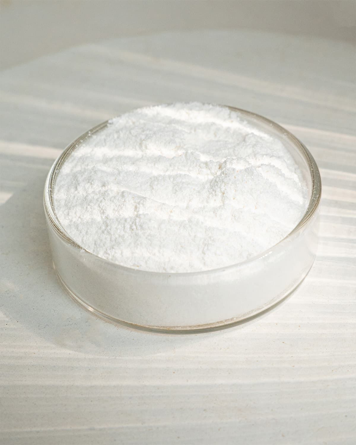Verpackung mit L-Tryptophan Pulver. Enthält Informationen zu Inhaltsstoffen und Anwendung.