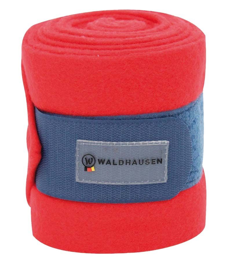 Gerollte rote Fleecebandagen mit blauem Klettverschluss. Waldhausen-Logo auf dem Verschluss.