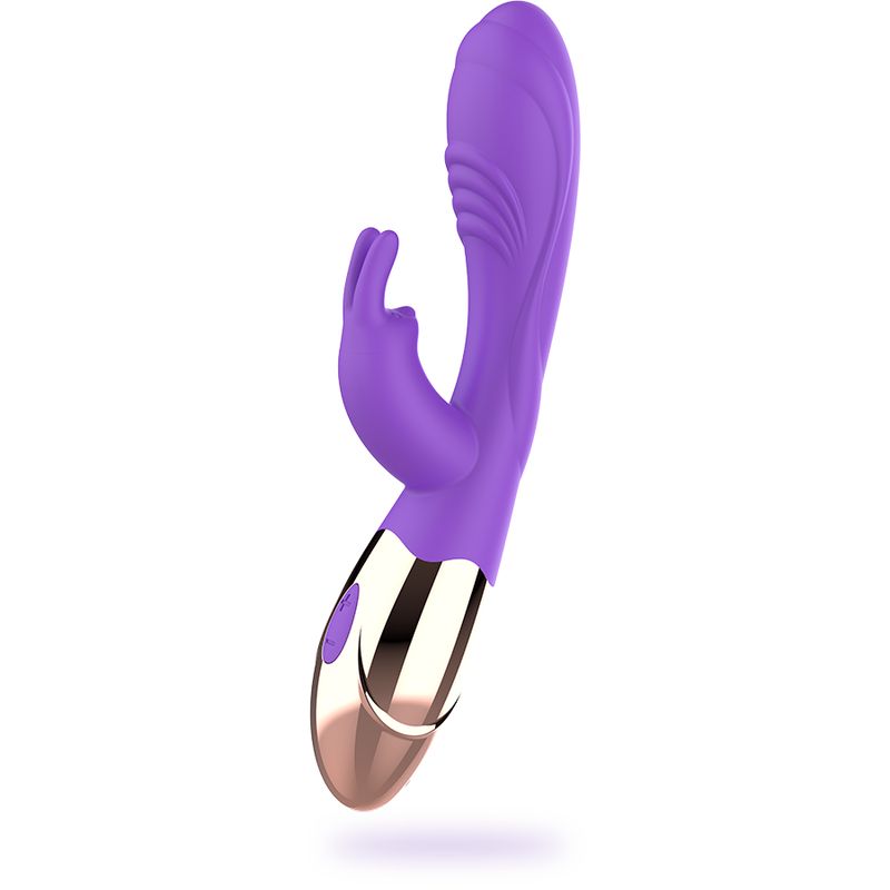 Lila Vibrator mit goldfarbenem Akzent. Silikon, ergonomische Form. Aufsatz in Fingerform.