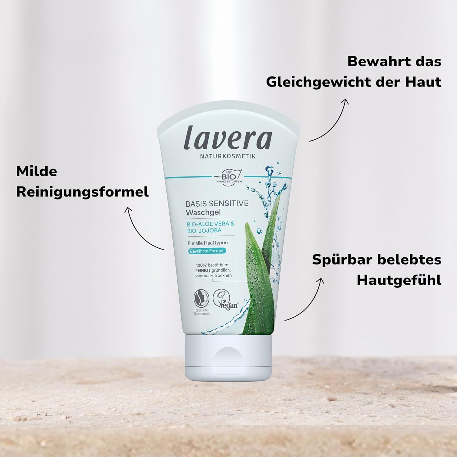 Weiß-türkise Tube mit Produktnamen und Aloe Vera-Illustration. Text: "Milde Reinigungsformel". Vegan-Siegel.