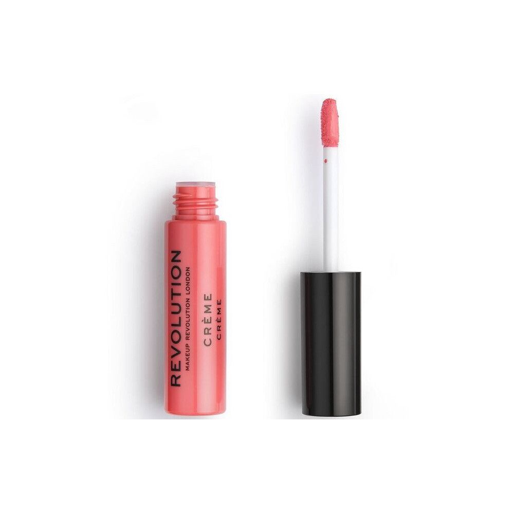 Makeup Revolution Creme Lippenstift. Rosa Lippenstift-Tube und Applikator. Schwarzer Deckel. Produktname und Marke auf der Tube.