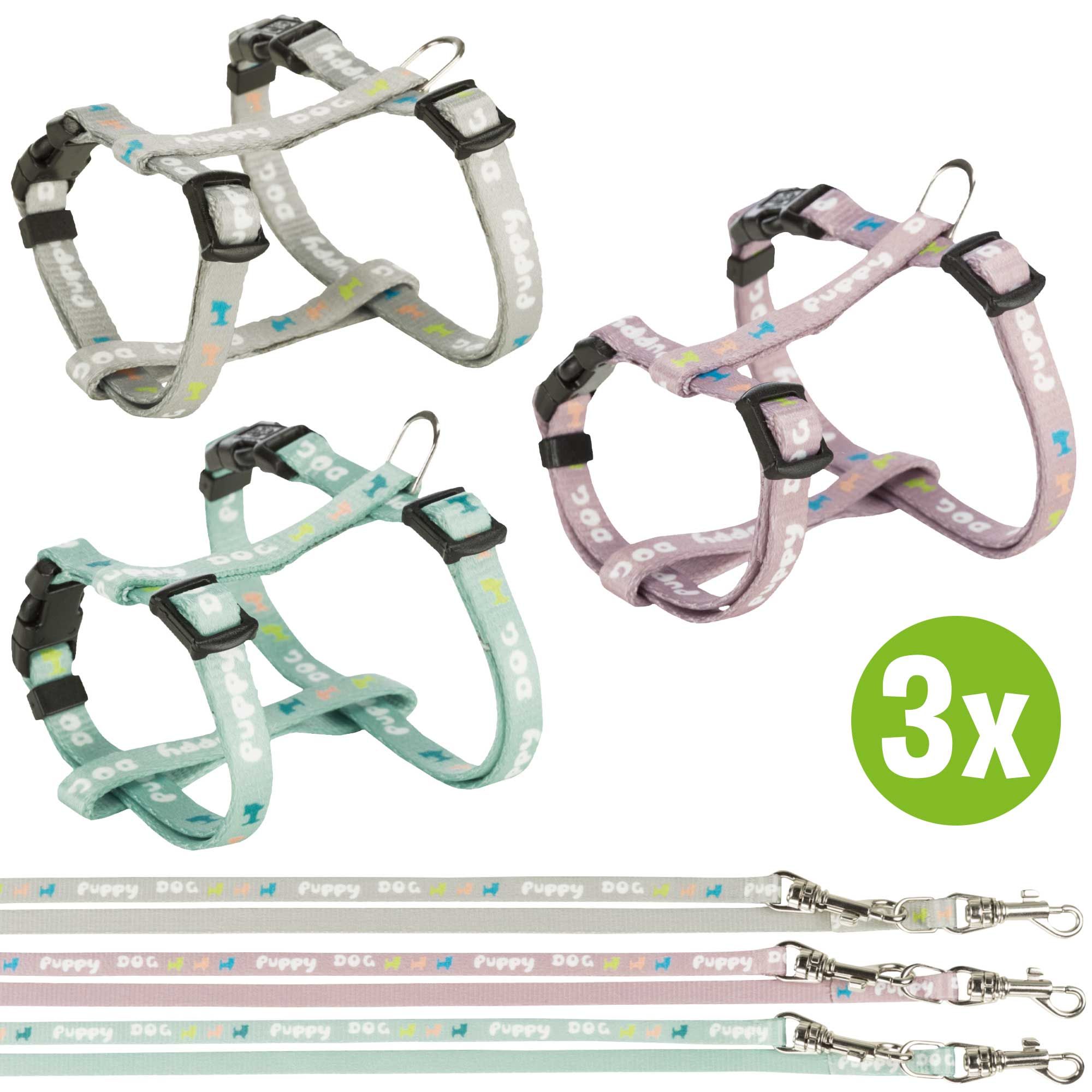 Drei Welpengeschirre und Leinen-Sets in Grau, Rosa und Mintgrün. Jedes Set enthält Geschirr und Leine. Aufschrift: Puppy Dog. 3x-Kennzeichnung.