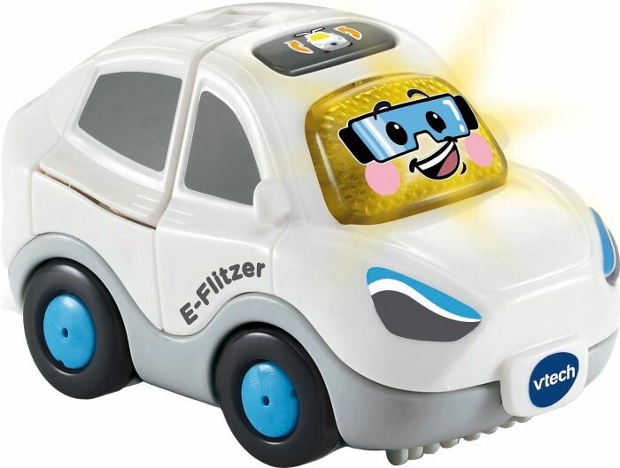 Weißes Spielzeugauto mit blauen Rädern. Auf der Windschutzscheibe ist ein lächelndes Gesicht abgebildet. VTech-Logo.