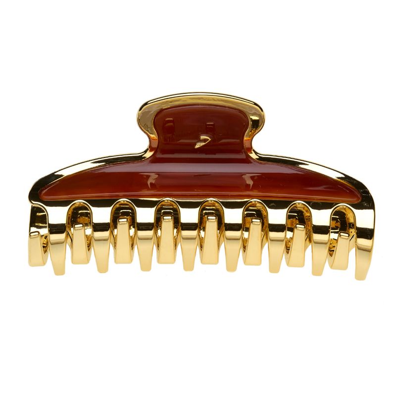 Haarspange mit goldfarbenem Rahmen und braunem Einsatz. Sie hat eine ovale Form und Zähne zum Halten der Haare.
