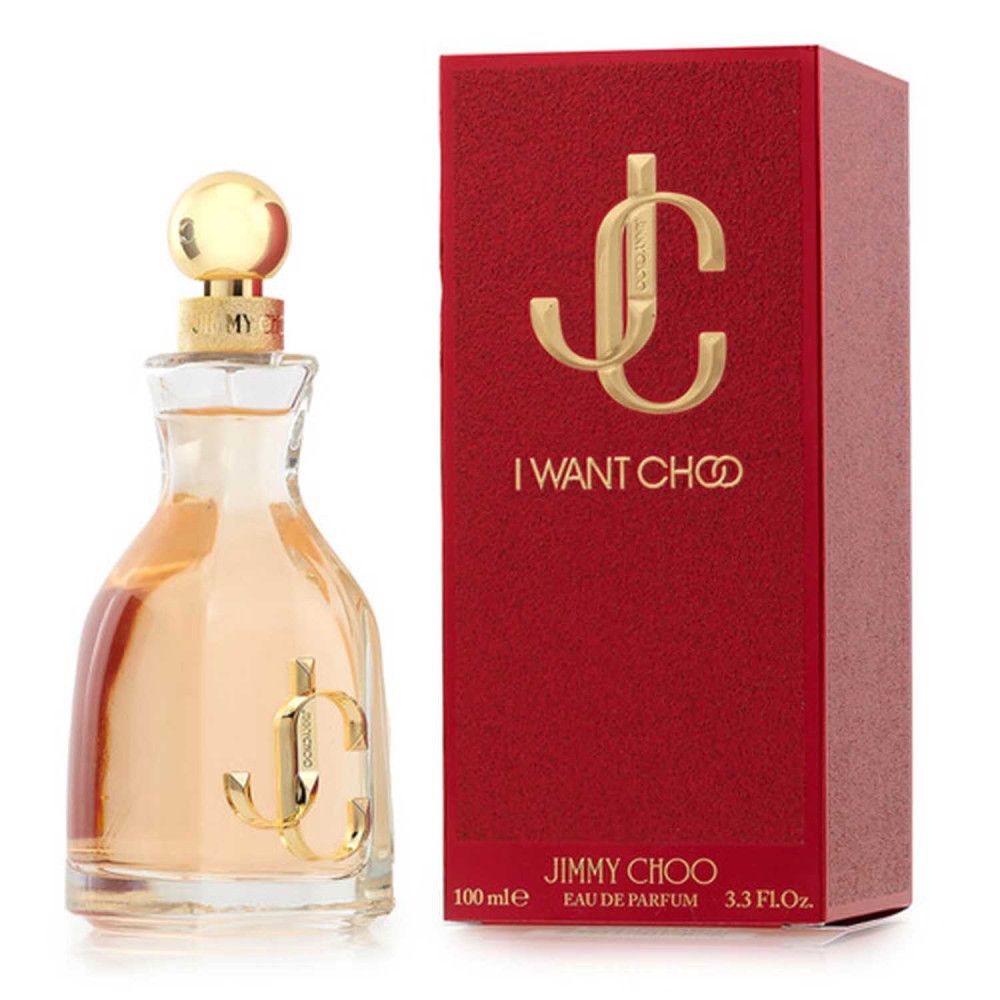 Parfümflakon und rote Schachtel. Goldfarbenes Logo und Schriftzug "I WANT CHOO". Flakon mit rosa Flüssigkeit.