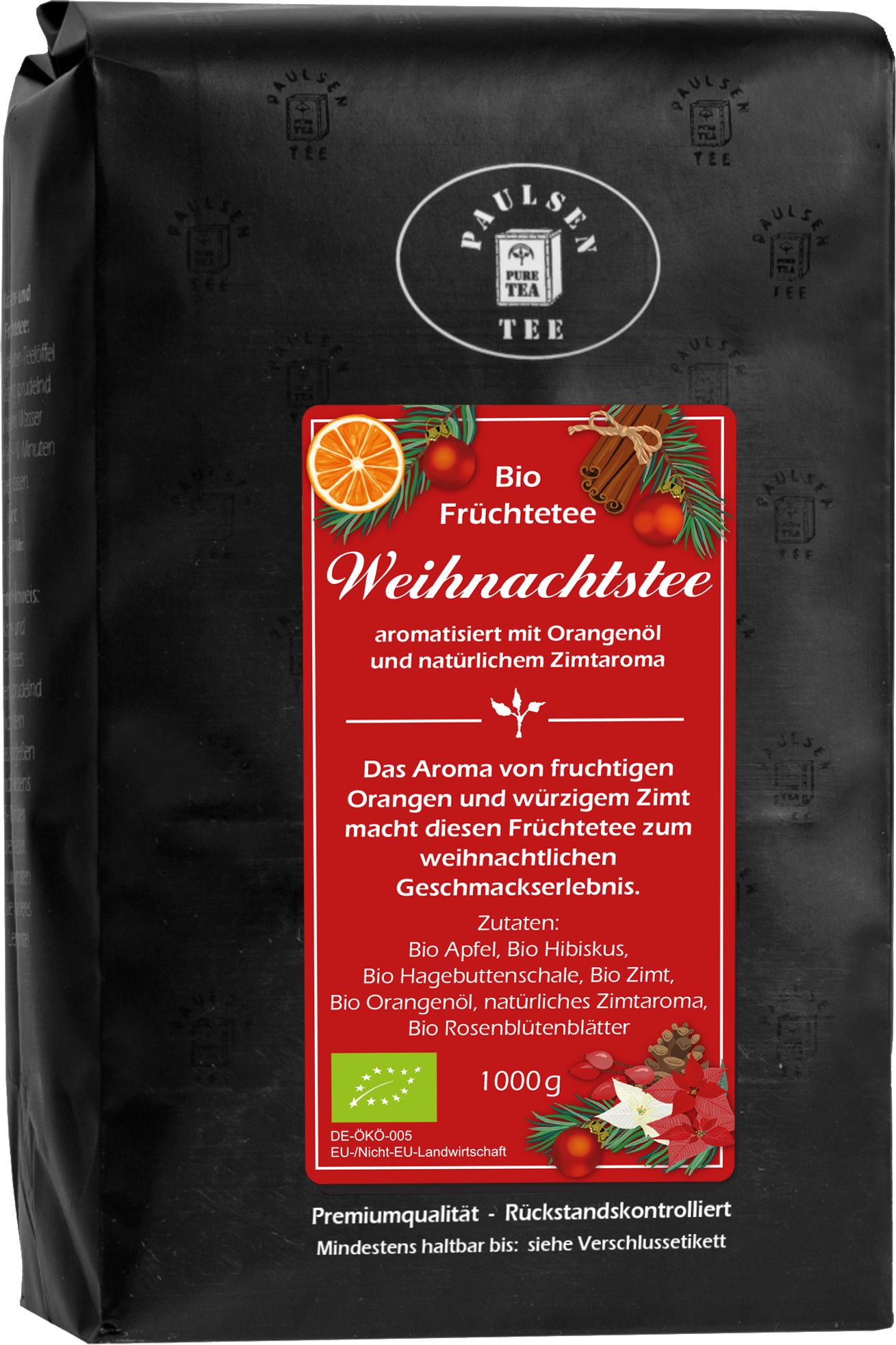 Schwarze Verpackung mit rotem Etikett. Aufschrift: Paulsen Bio Weihnachtstee. Mit Orangen- und Zimtaroma. Bio-Siegel.