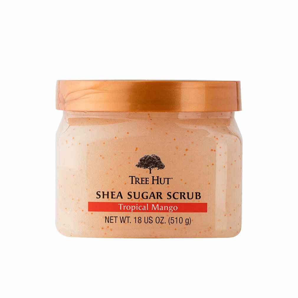 Tree Hut Shea Sugar Scrub Tropical Mango Körperpeeling in einem transparenten Behälter mit orangefarbenem Deckel.