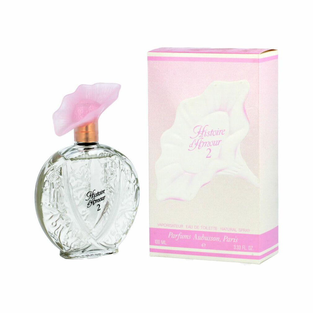 Runder Glasflakon mit rosa Blütenverschluss und Verpackung. Aufschrift: Histoire Amour 2. Rosa und weißes Design.