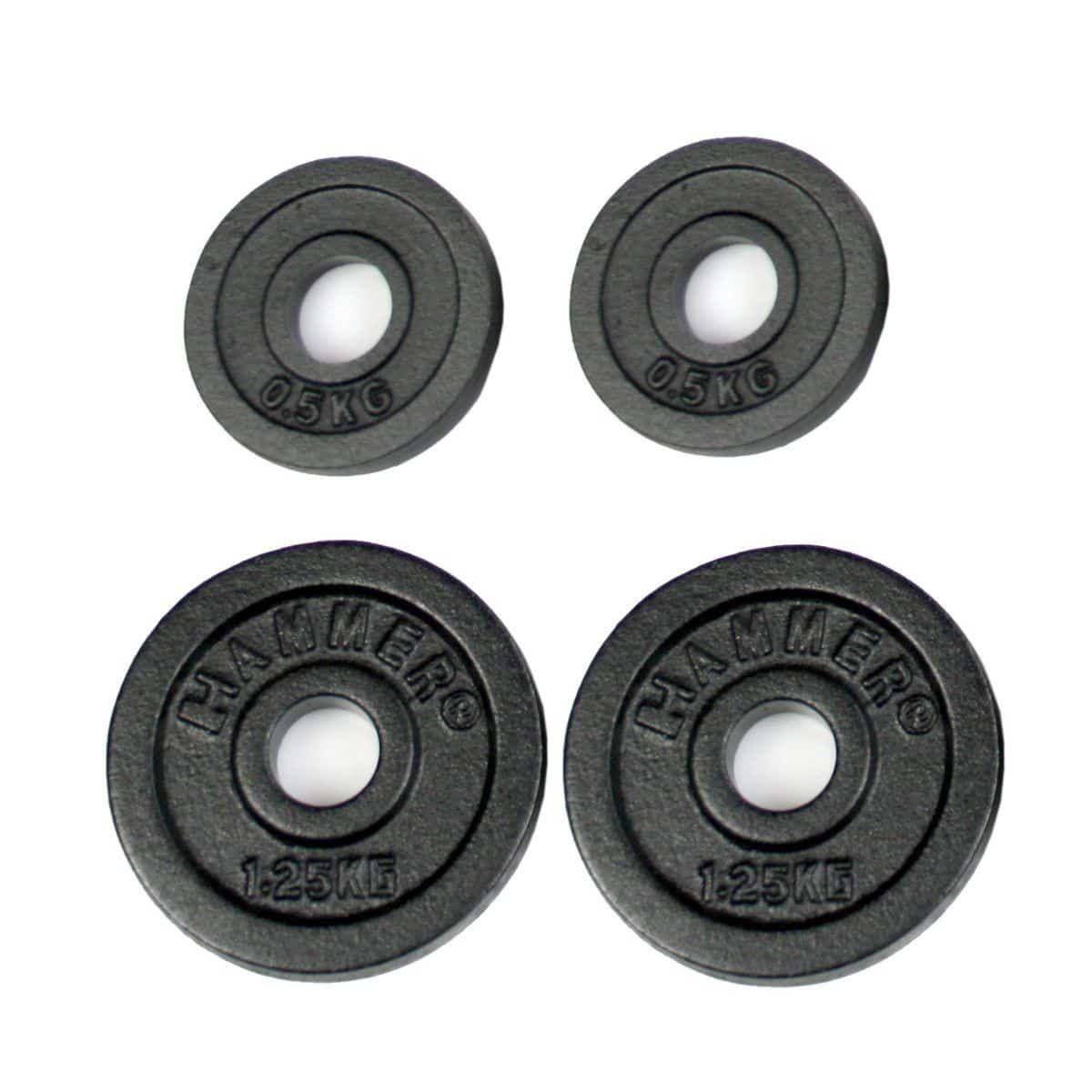 Vier schwarze Hantelscheiben. Zwei mit 0,5 kg und zwei mit 1,25 kg. HAMMER-Logo und Gewichtsangabe sind sichtbar.