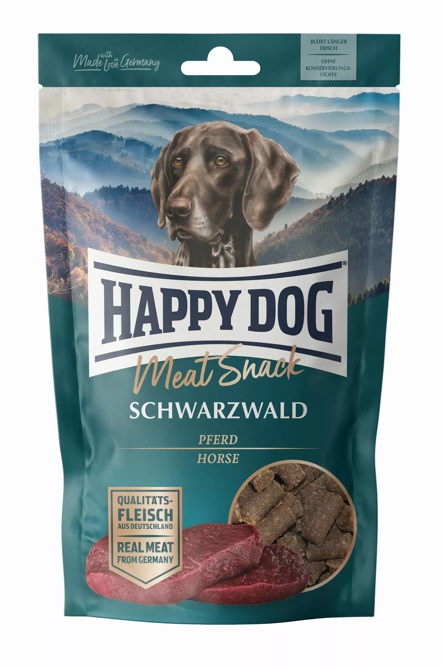 Verpackung von Hundesnacks. Aufschrift: HAPPY DOG Meat Snack Schwarzwald, Pferd. Abbildung eines Hundes und Fleischstücke.