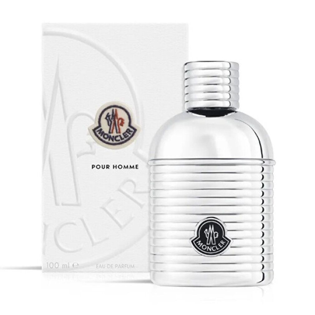 Silberfarbener Flakon und Verpackung. Moncler Pour Homme EDP. Logo und Schriftzug auf Flakon und Verpackung.