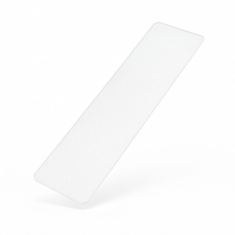 Rechteckiges, transparentes Pflaster mit abgerundeten Ecken. Oberfläche mit feiner Textur. Auf weißem Hintergrund.