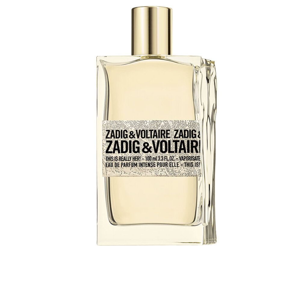 Zadig & Voltaire Duftflakon. Rechteckige Form, goldfarbener Verschluss. Aufkleber mit Produktinformationen.