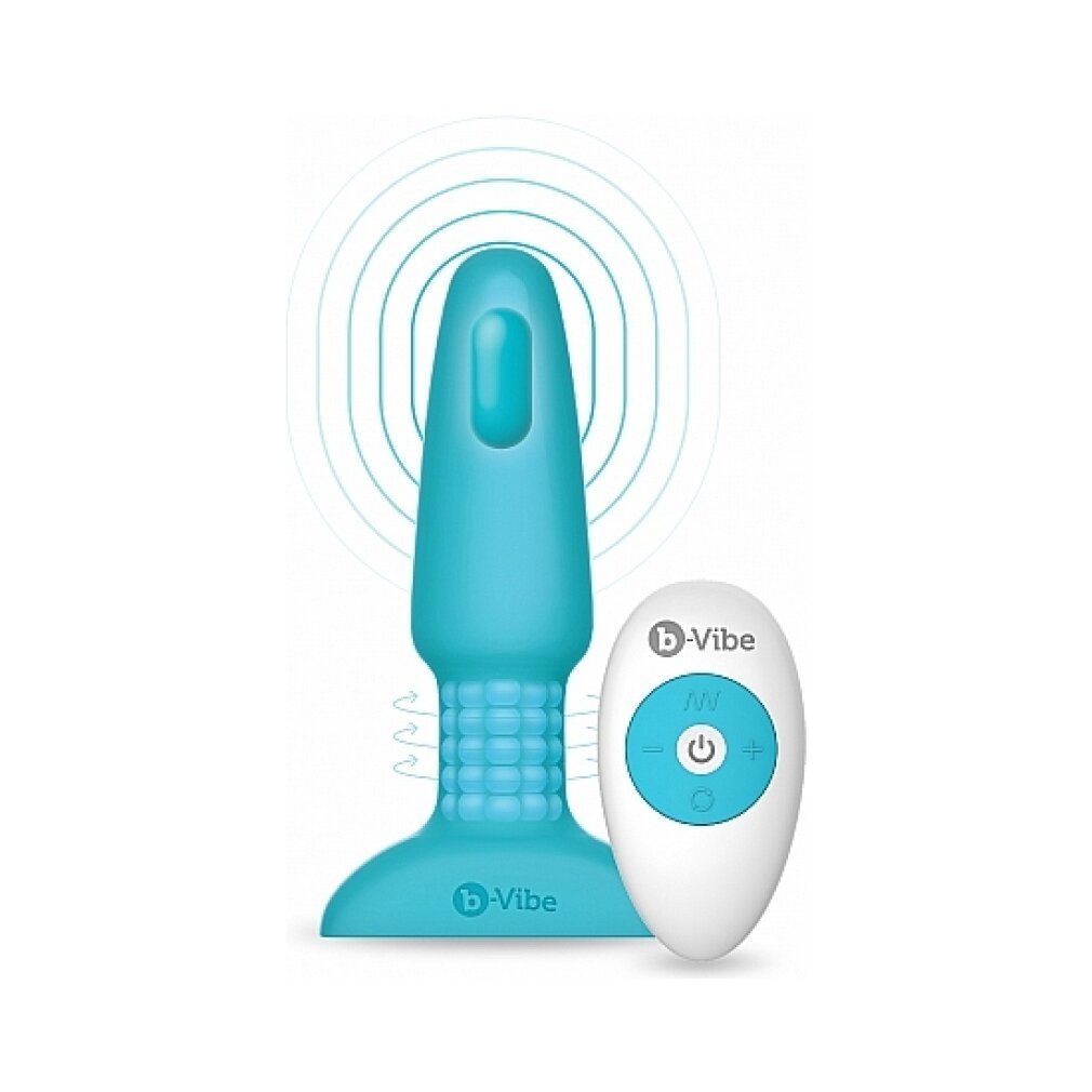 Türkisfarbener Analvibrator mit Fernbedienung. B-vibe Logo. Wellen-Symbol.