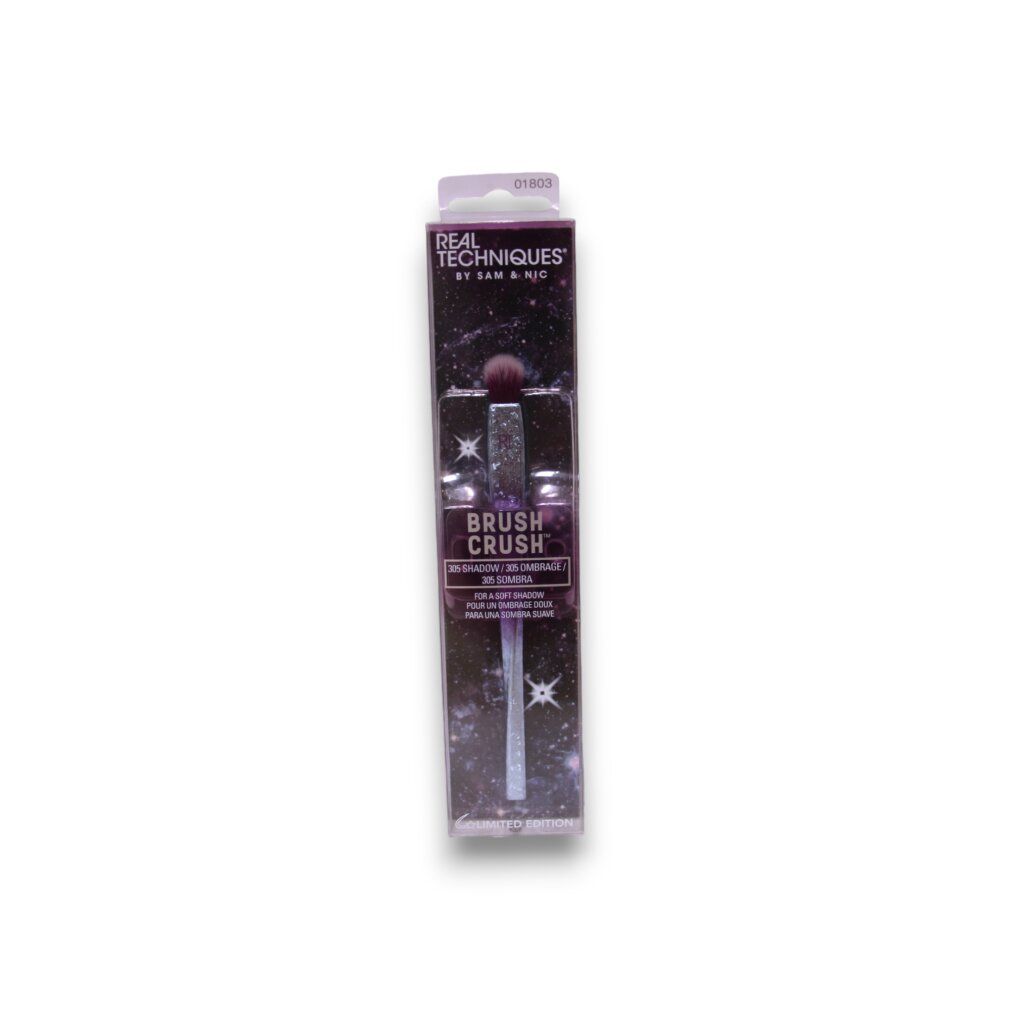Pinsel in Verpackung. Rosa Pinselborsten, hellblauer Griff mit Glitzer. Text: Real Techniques, Brush Crush, Limited Edition.