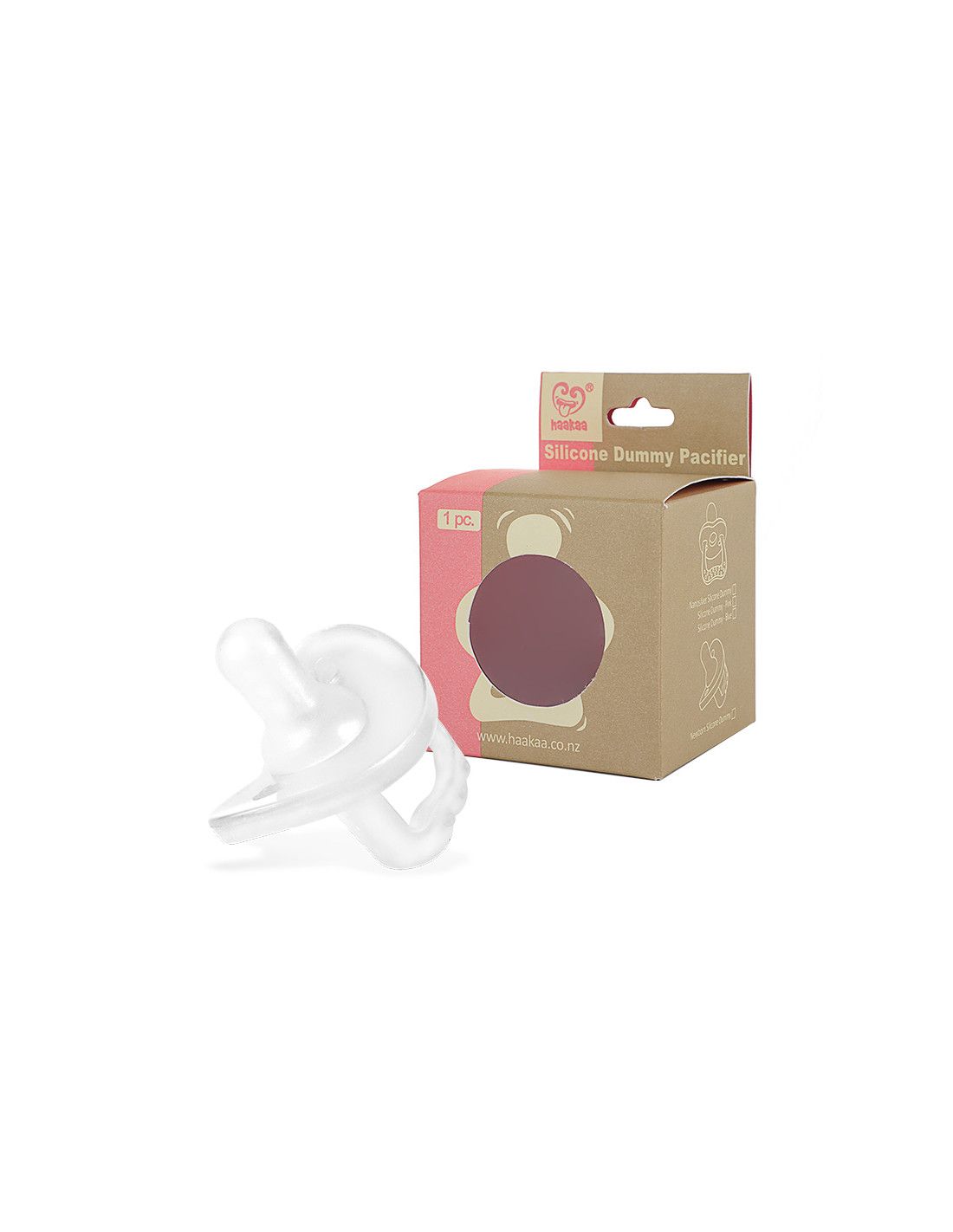Beruhigungssauger in Verpackung. Transparenter Silikon-Schnuller neben einer braunen Pappschachtel.