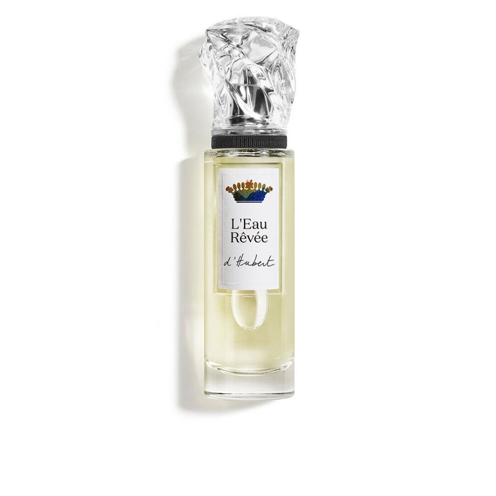 Parfümflasche mit klarem Glas und silbernem Verschluss. Das Etikett zeigt 'L'Eau Rêvée d'Alma'.