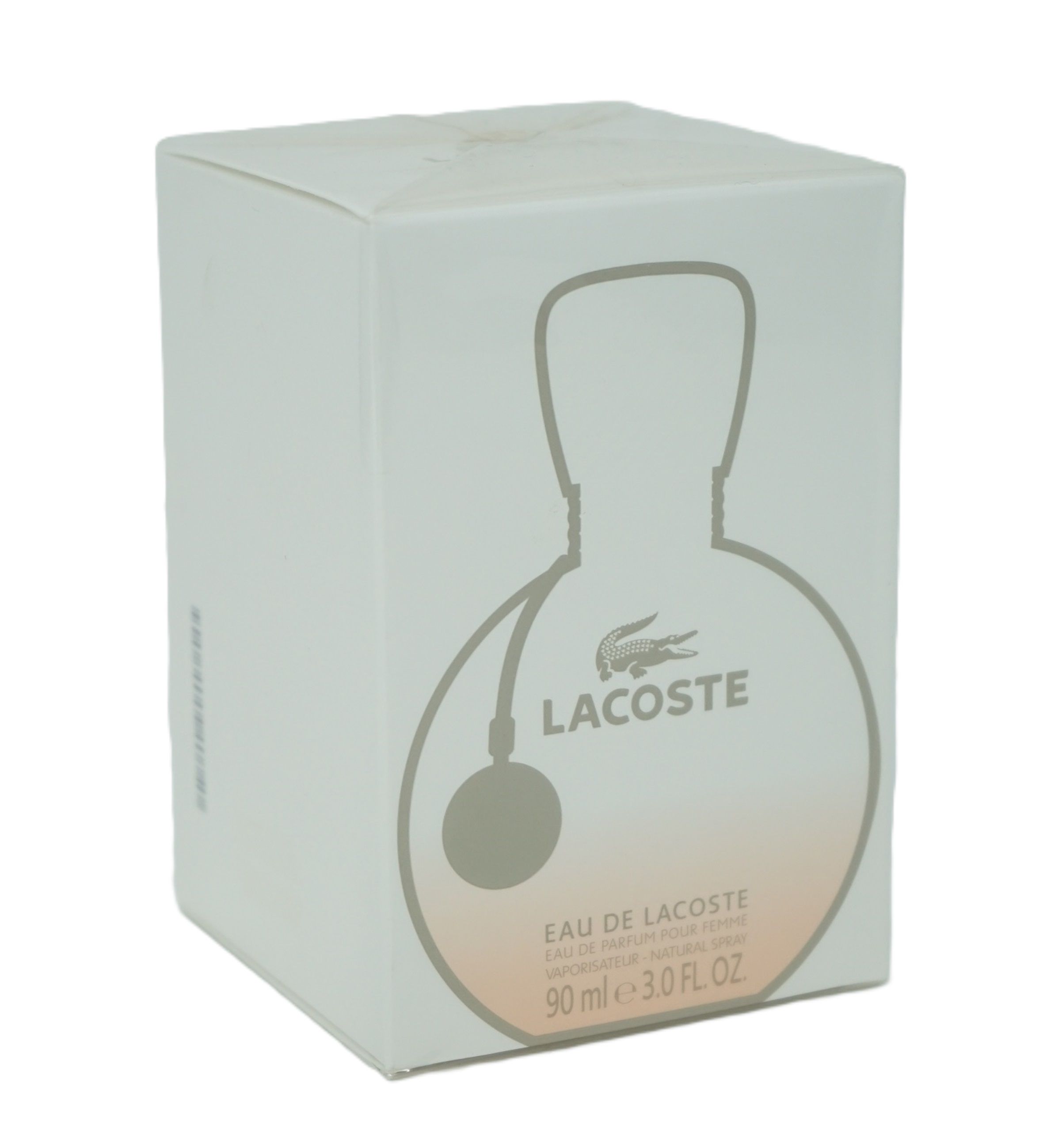 Verpackung. Weißer Karton mit Logo und Produktnamen. Text: Eau de Lacoste Pour Femme. 90 ml.