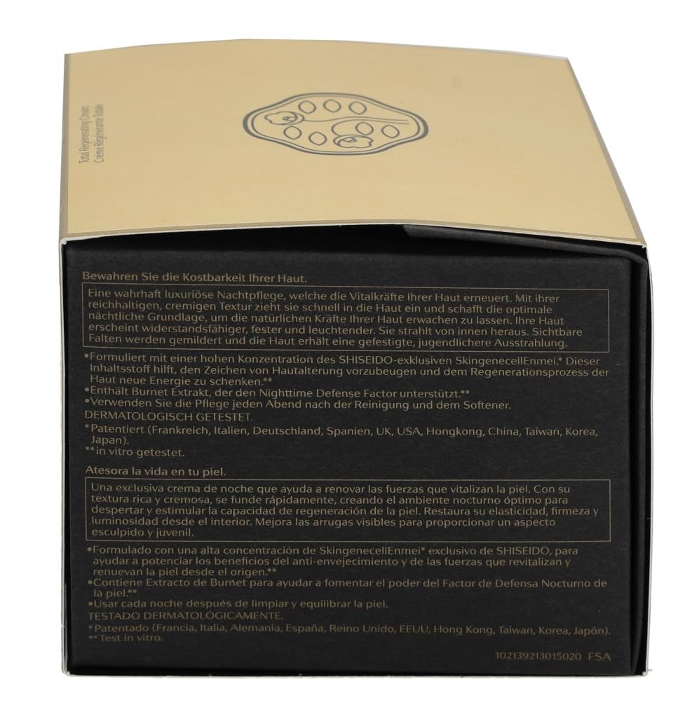 Rückseite der goldfarbenen Schachtel. Text in mehreren Sprachen. Logo oben. Text: Dermatologisch getestet.