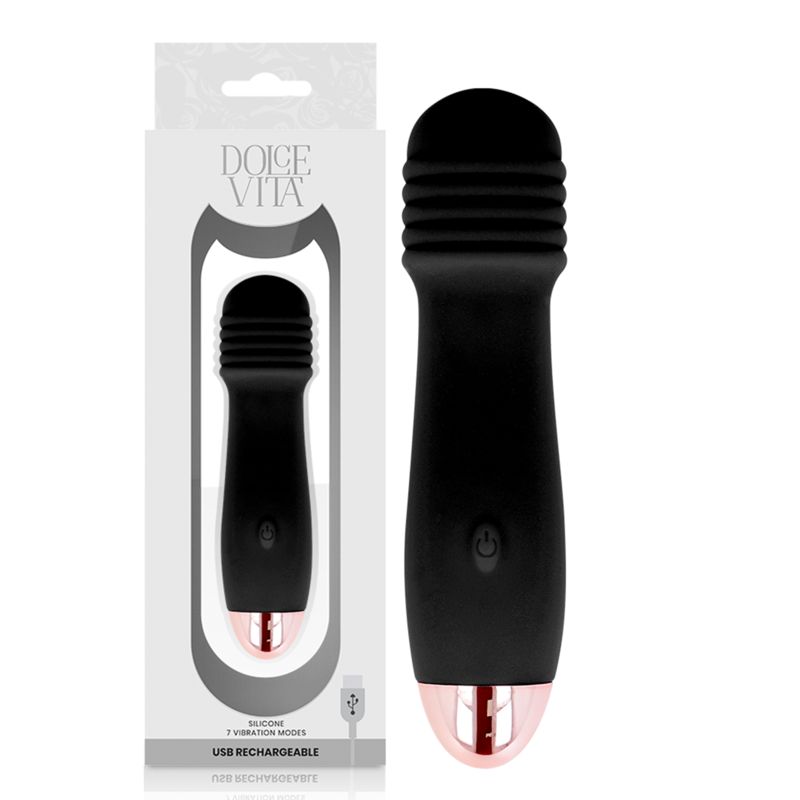 Schwarzer Silikon-Vibrator in seiner Verpackung. Der Vibrator hat einen gerippten Kopf und eine roséfarbene Spitze.