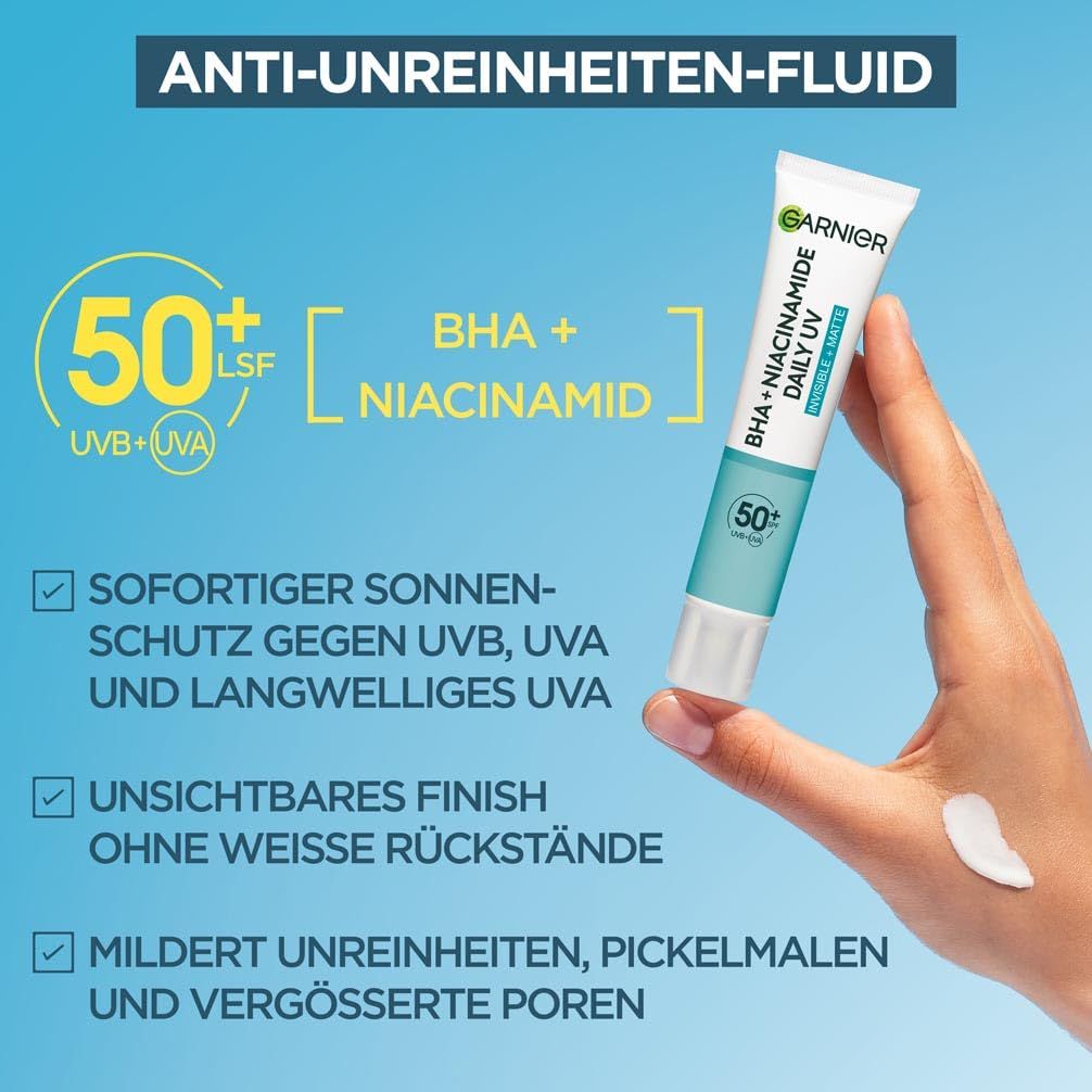 Garnier Hautklar BHA + Niacinamid Daily UV. Tube in Hand. Text: BHA + Niacinamid, LSF 50+. Creme auf Hand.