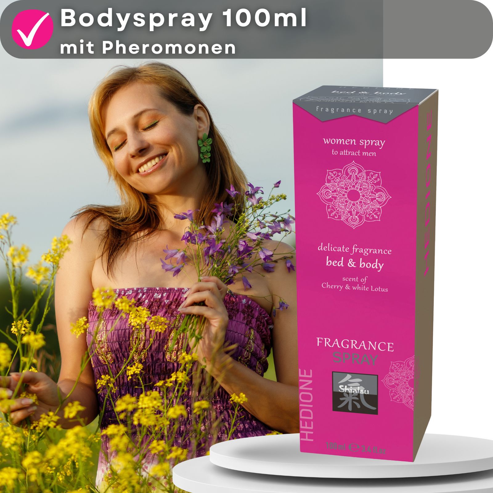 Frau mit Blumen, Flakon und Verpackung. Aufschrift: Bodyspray, mit Pheromonen, HEDIONE, Shiatsu.