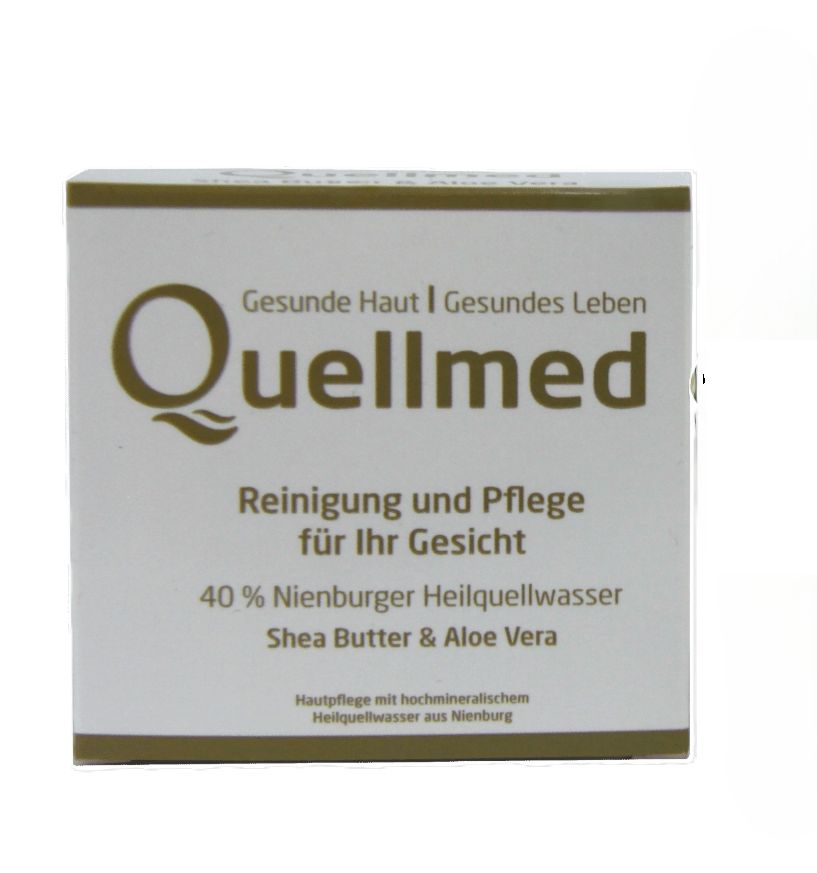 Quellmed-Verpackung. Weißer Karton mit Logo und Produktinformationen: Reinigung & Pflege für Ihr Gesicht, 40% Nienburger Heilquellwasser.