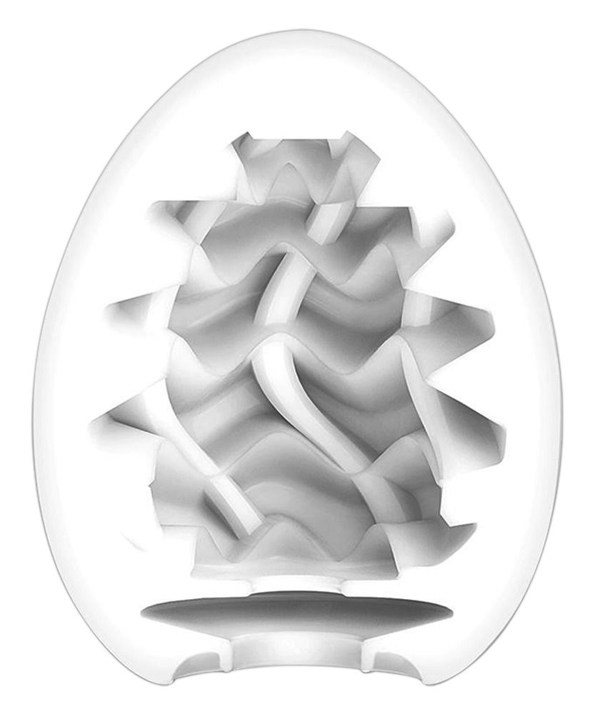 TENGA Egg Wavy II. Weißes, ovales Produkt mit wellenförmiger Innenstruktur. Unterseite mit kleinem Sockel.