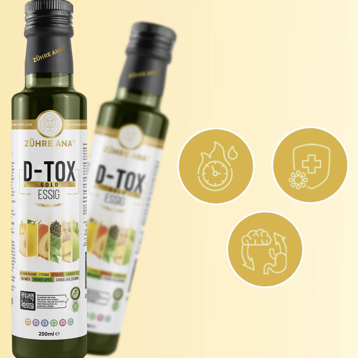 Zwei grüne Flaschen mit schwarzem Deckel. Aufschrift: Zühre Ana D-Tox Gold Essig. Hintergrund mit Icons: Uhr, Schild, Darm.