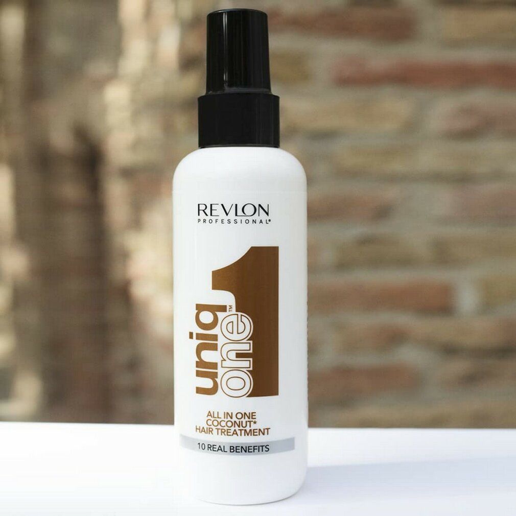 Weißes Spray mit schwarzem Sprühkopf. Aufschrift: Revlon Professional Uniq One All in One Coconut Hair Treatment.