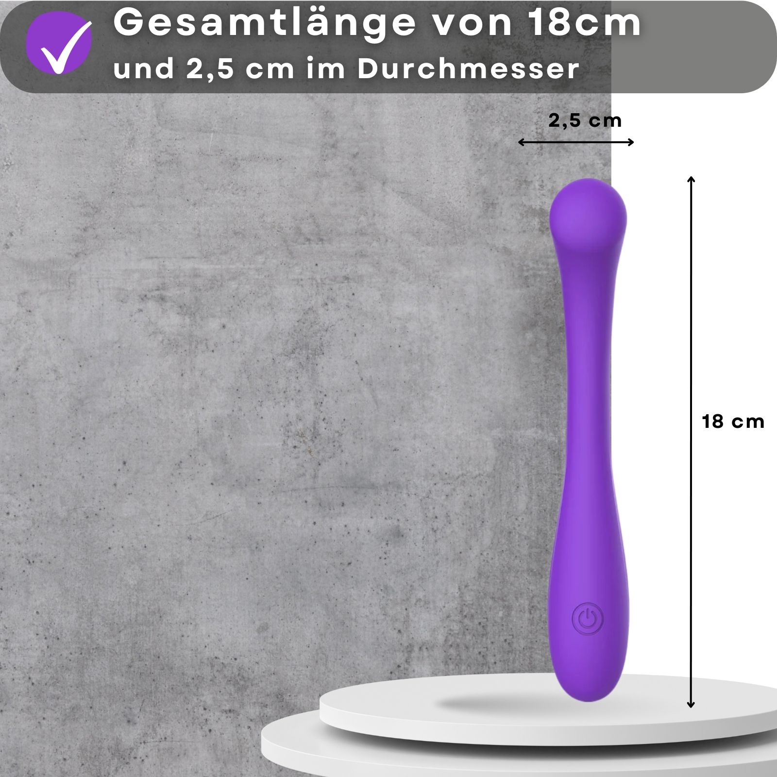 Lila Vibrator. Text: 18 cm lang, 2,5 cm Durchmesser. Auf Podest.