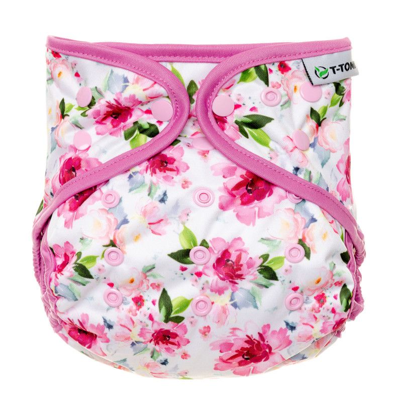 Weiße Stoffwindel mit Rosenmuster und pinkfarbenen Rändern. Druckknöpfe zum Verschließen. T-TOMI Logo.