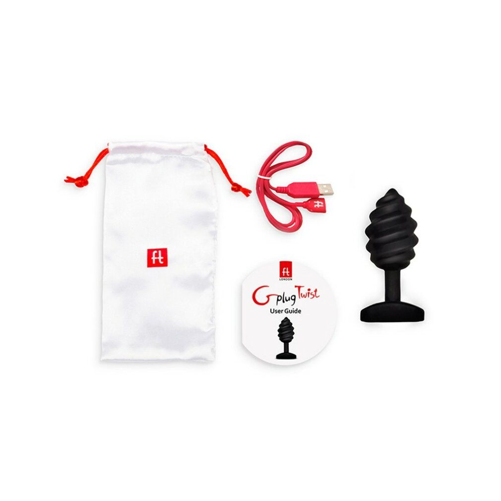 Zubehörset mit schwarzem Plug, weißem Beutel, USB-Kabel und Bedienungsanleitung. Der Plug hat eine spiralförmige Form.