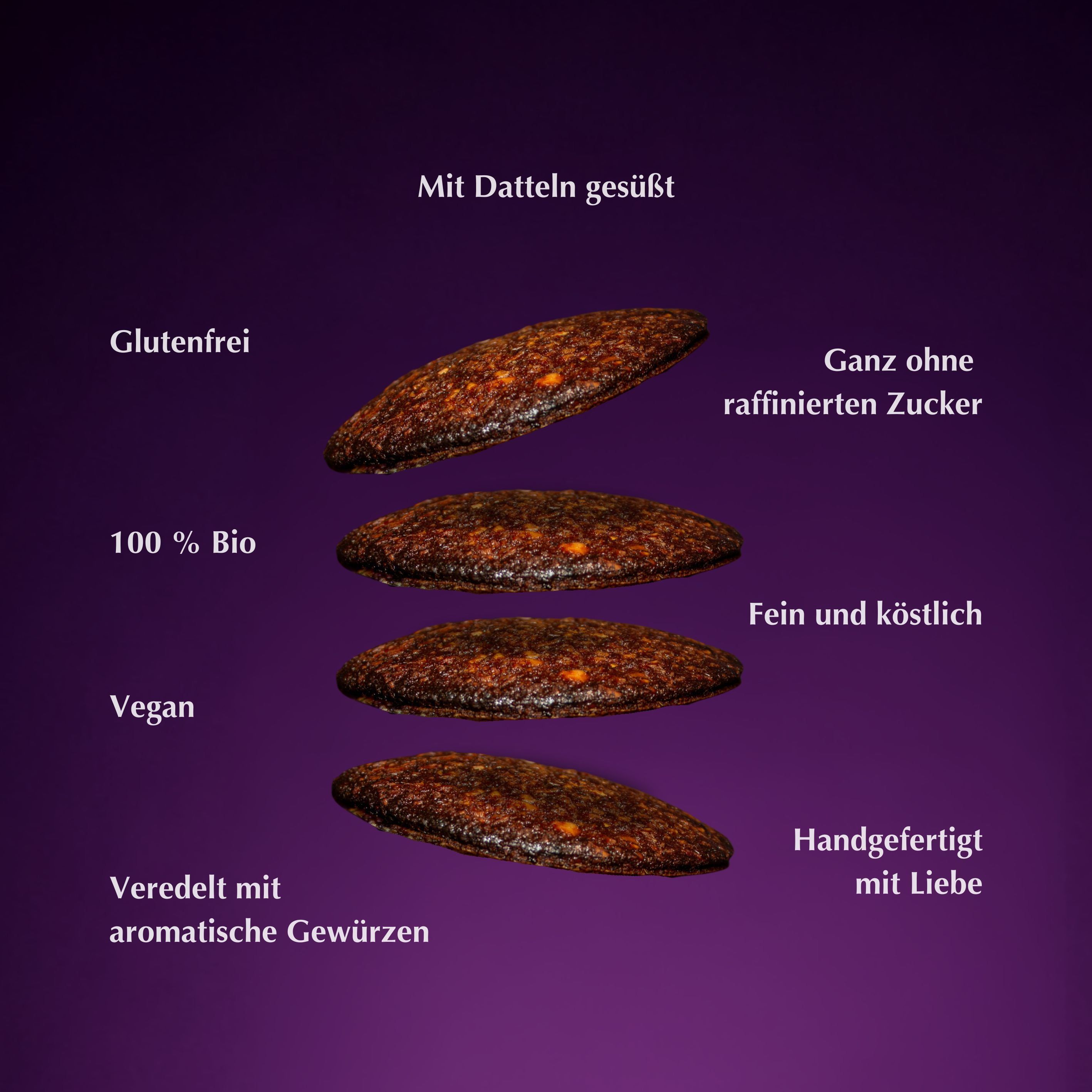 Vier Lebkuchen schweben. Text: Glutenfrei, 100% Bio, Vegan, mit Gewürzen veredelt, ohne Zucker, fein, handgefertigt.