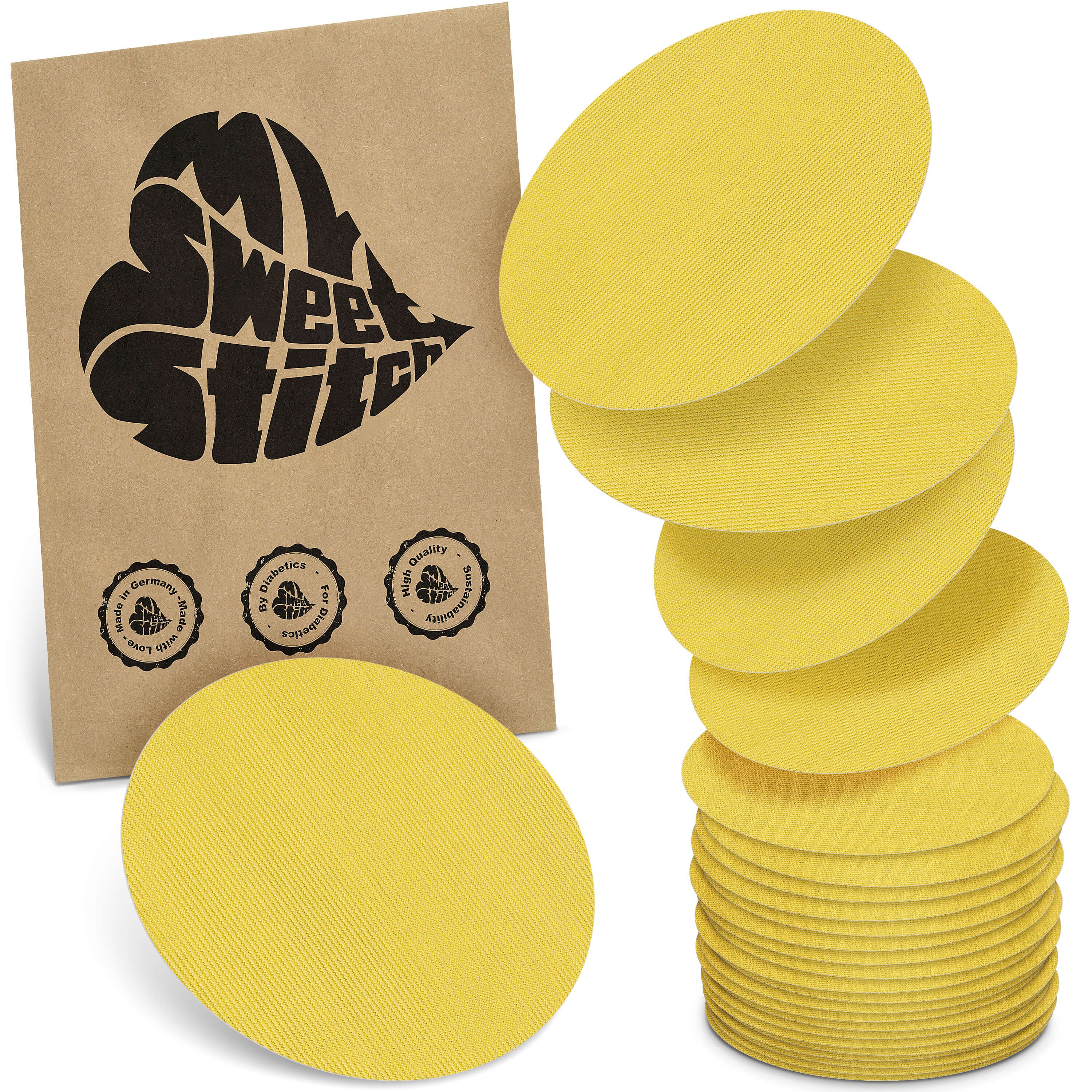 Gelbe, ovale Pflaster. Verpackung mit Logo und Siegeln. Stapel und einzelne Pflaster sichtbar.