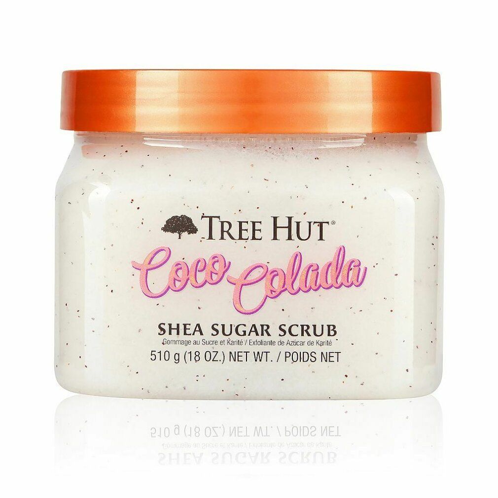 Tree Hut Coco Colada Shea Sugar Scrub in einem durchsichtigen Behälter mit orangefarbenem Deckel.