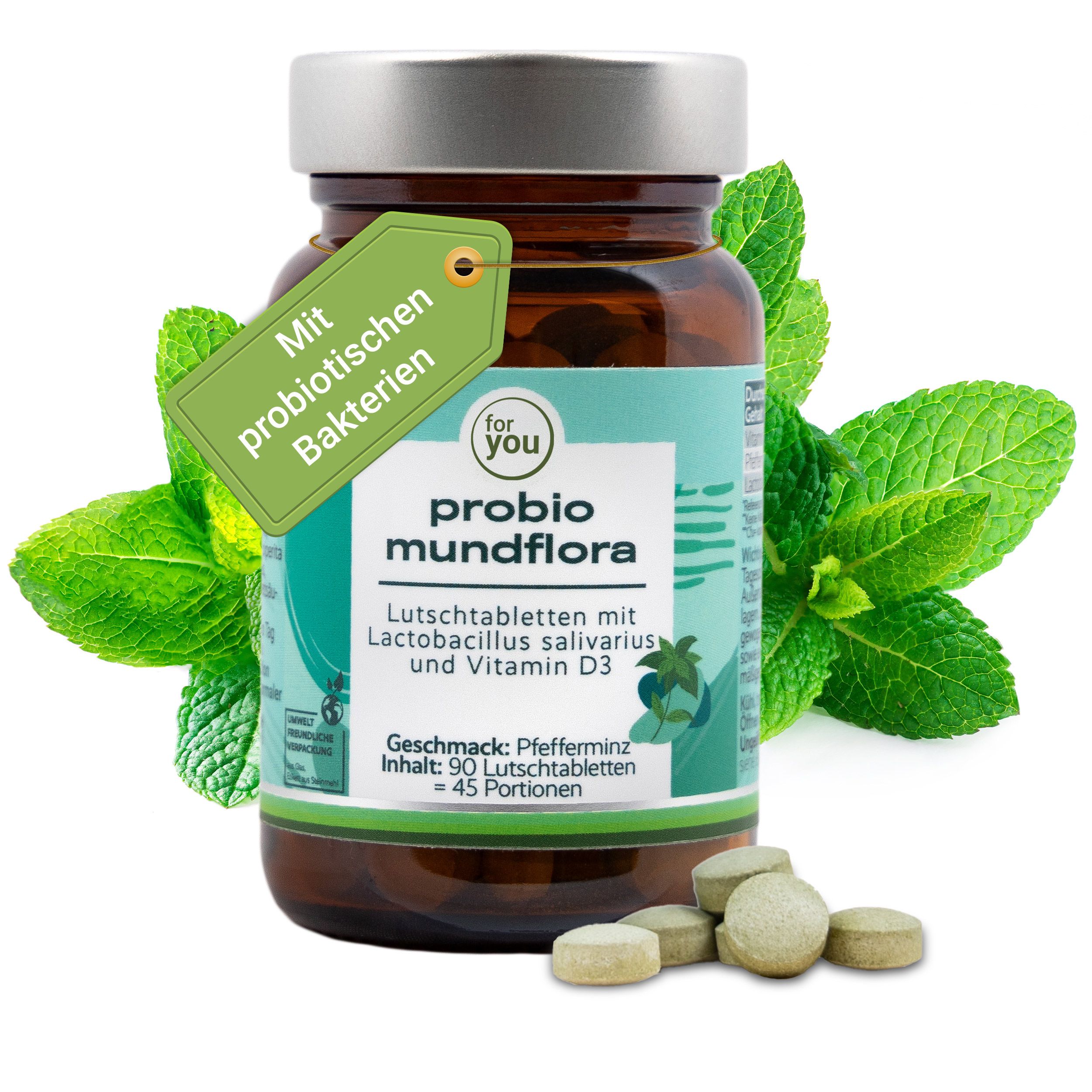 Braune Glasflasche mit Probio Mundflora Lutschtabletten, umgeben von Minzblättern.
